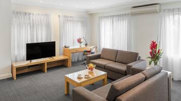 Three Bedroom Villa | Living area | 40-inch LCD TV with digital channels, TV, ping pong