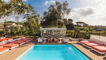 Outdoor pool, pool umbrellas, pool loungers