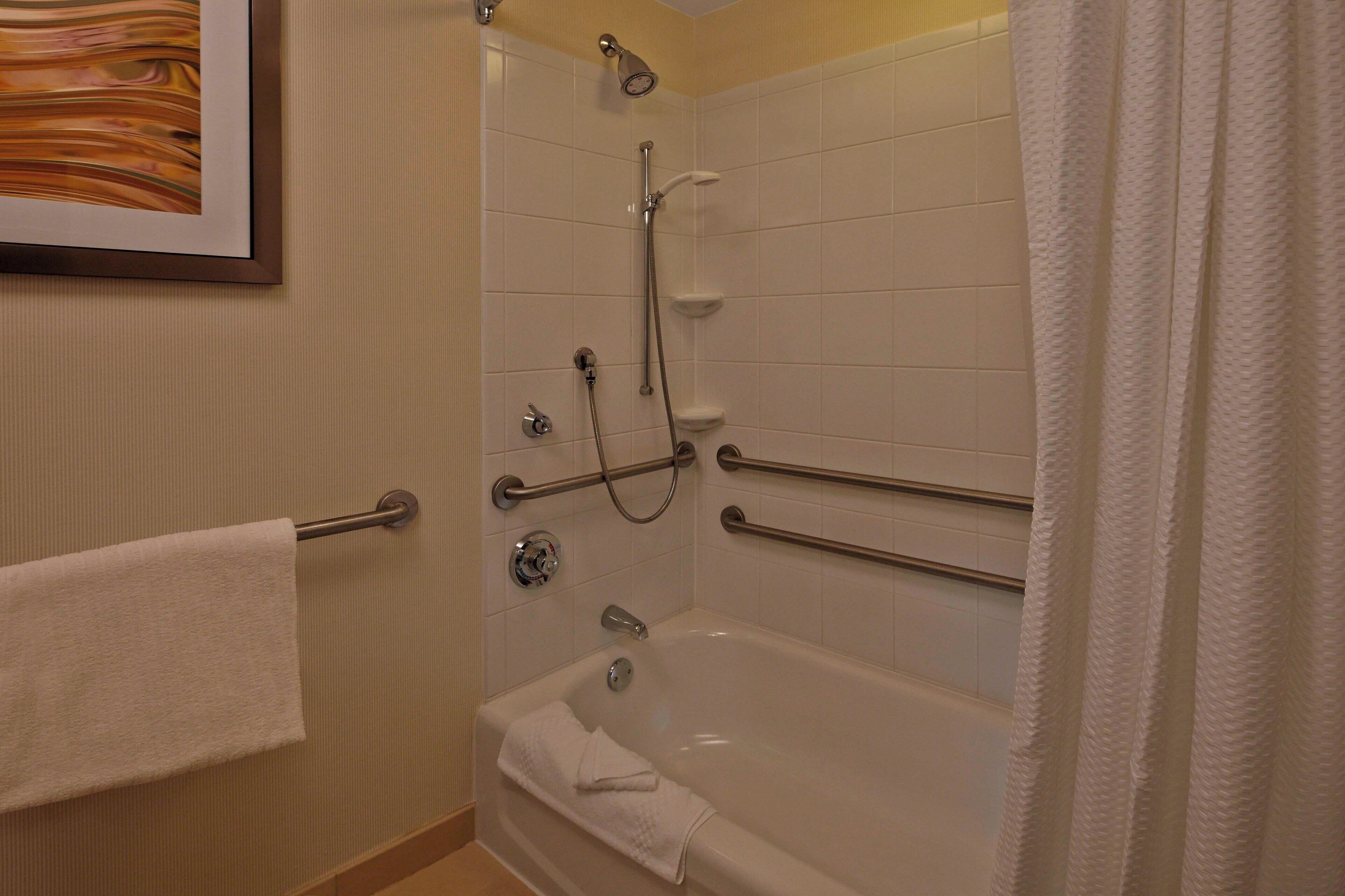 combined shower/bathtub, free toiletries, hair dryer, towels