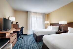 A hotel room with a desk, two beds, a TV, and a window with curtains. - Fairfield Inn by Marriott Lexington Park Patuxent River Naval Air Station (Lexington Park)