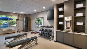 A gym with treadmills, weight machines, and a rack of dumbbells. - Fairfield Inn by Marriott Lexington Park Patuxent River Naval Air Station (Lexington Park)