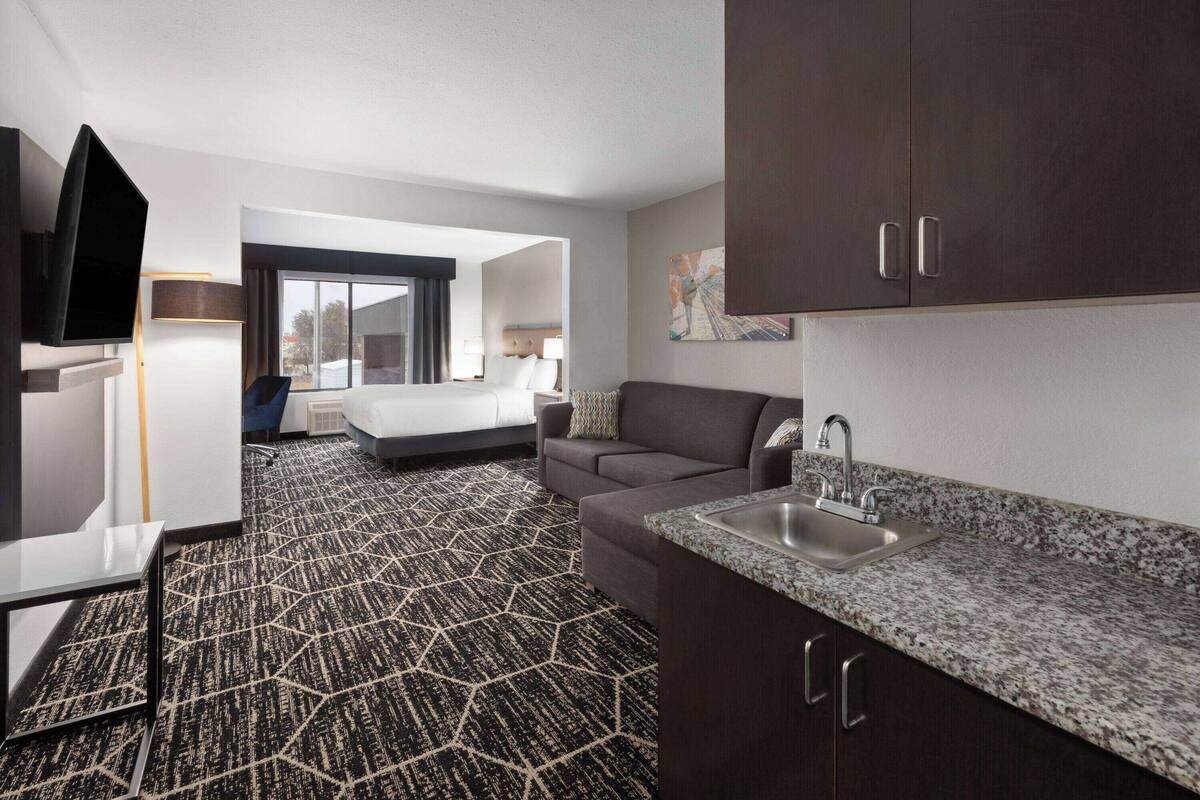 suite, 1 king bed with sofa bed, mobility accessible, non smoking (shower w/ grab bars) | desk, iron/ironing board, cots/infant beds, rollaway beds