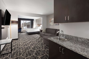 Escritorio, tabla de planchar con plancha y cunas