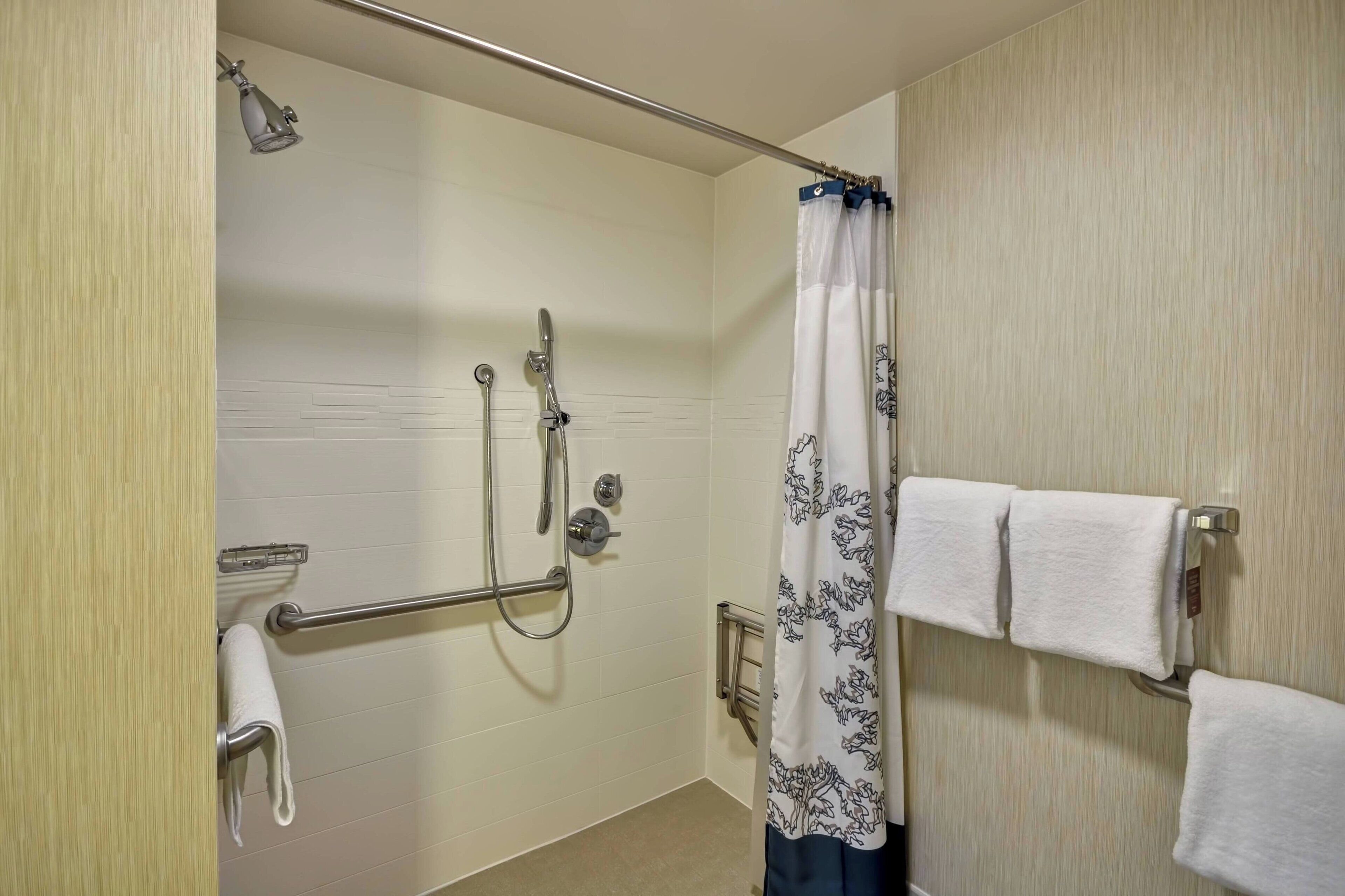 combined shower/bathtub, free toiletries, hair dryer, towels