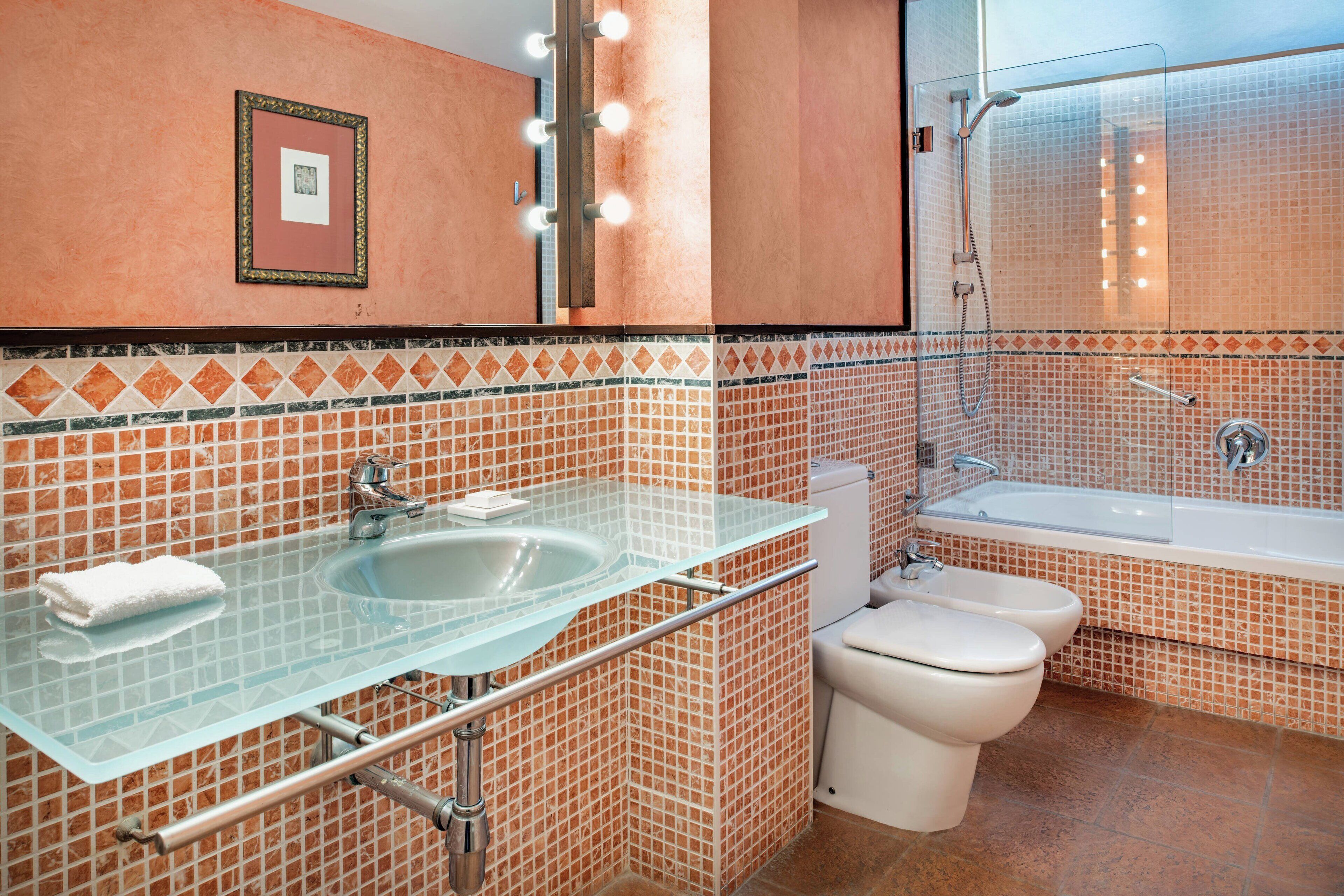 free toiletries, hair dryer, bidet, towels