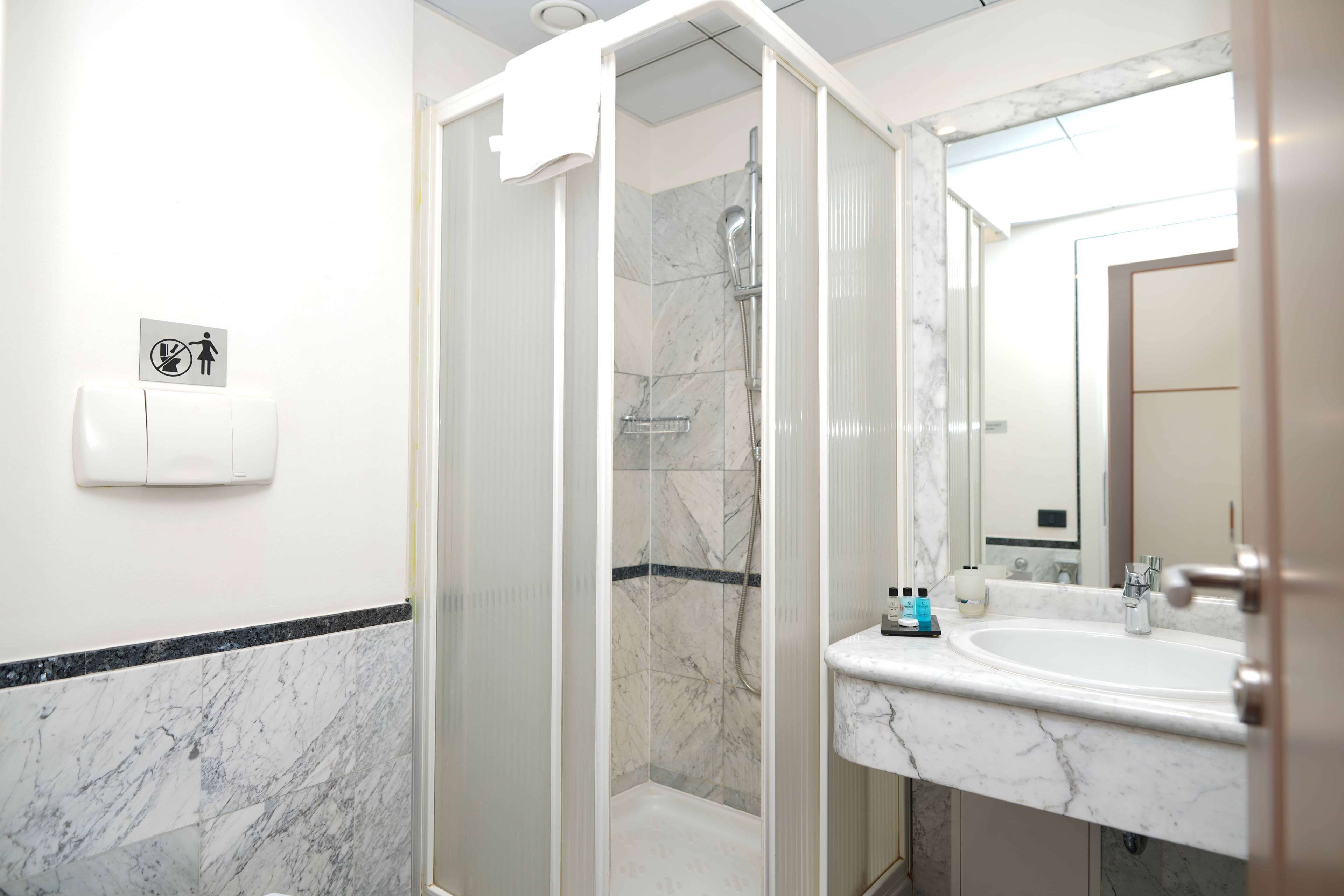 shower, free toiletries, hair dryer, slippers