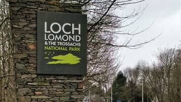 A sign for Loch Lomond & the Trossachs National Park.
