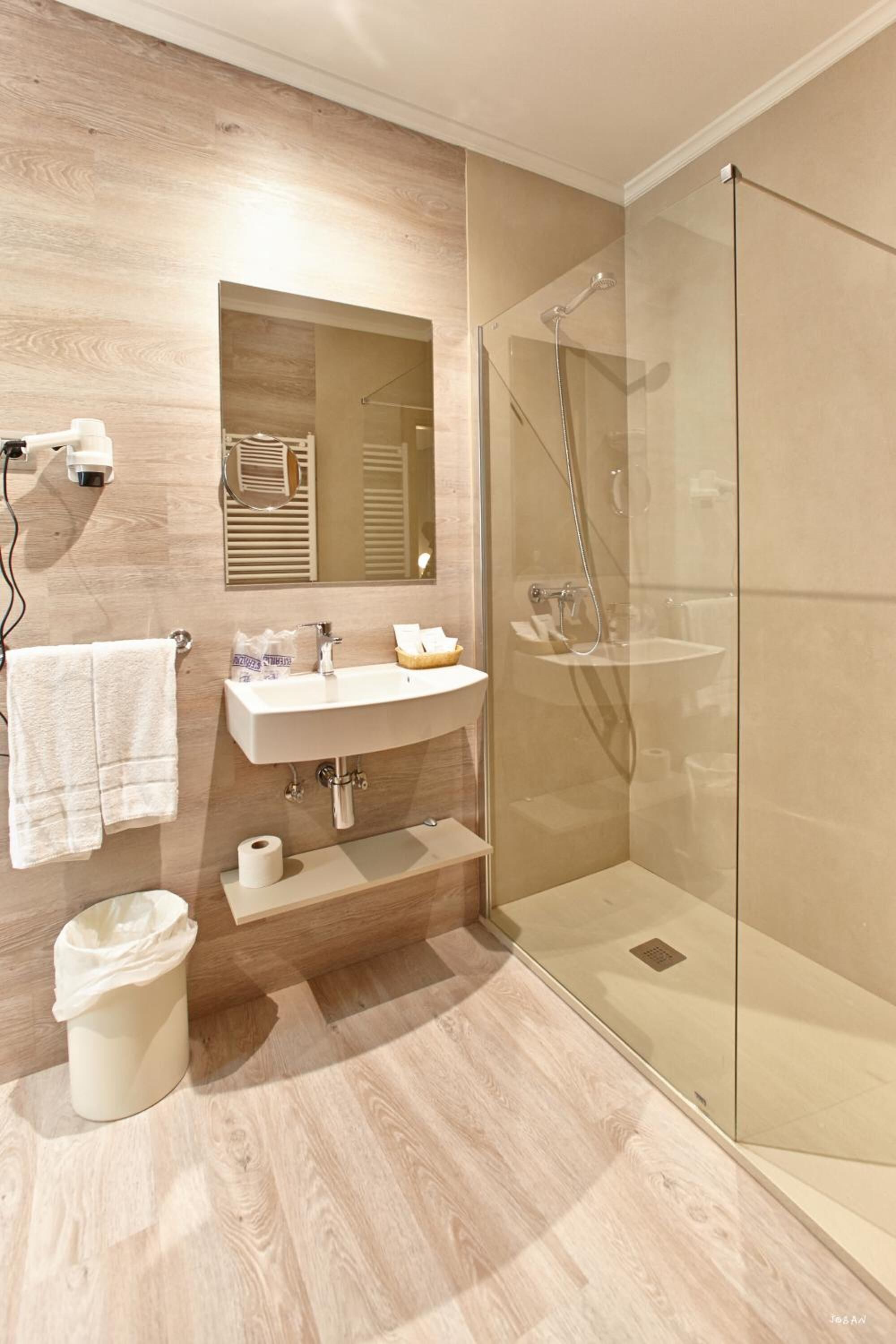 free toiletries, hair dryer, bidet, towels