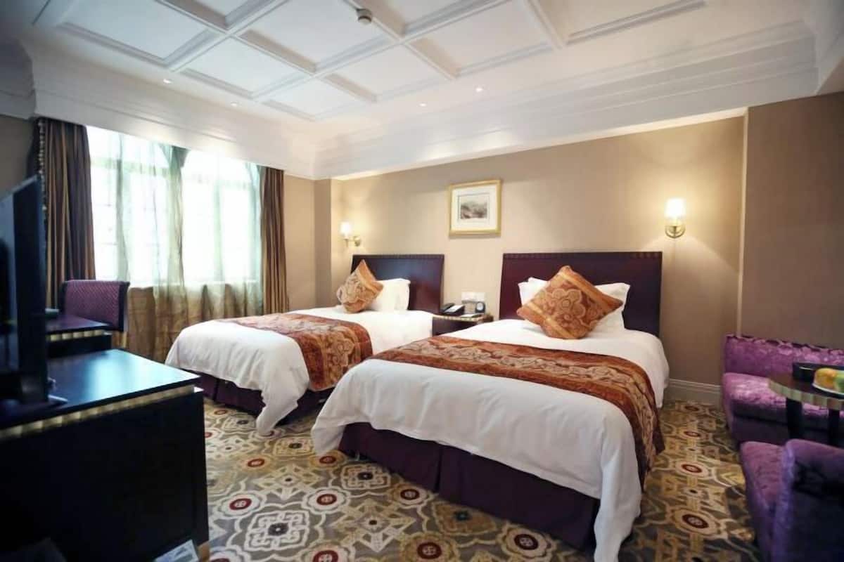 Premium bedding, memory foam beds, minibar, in-room safe
