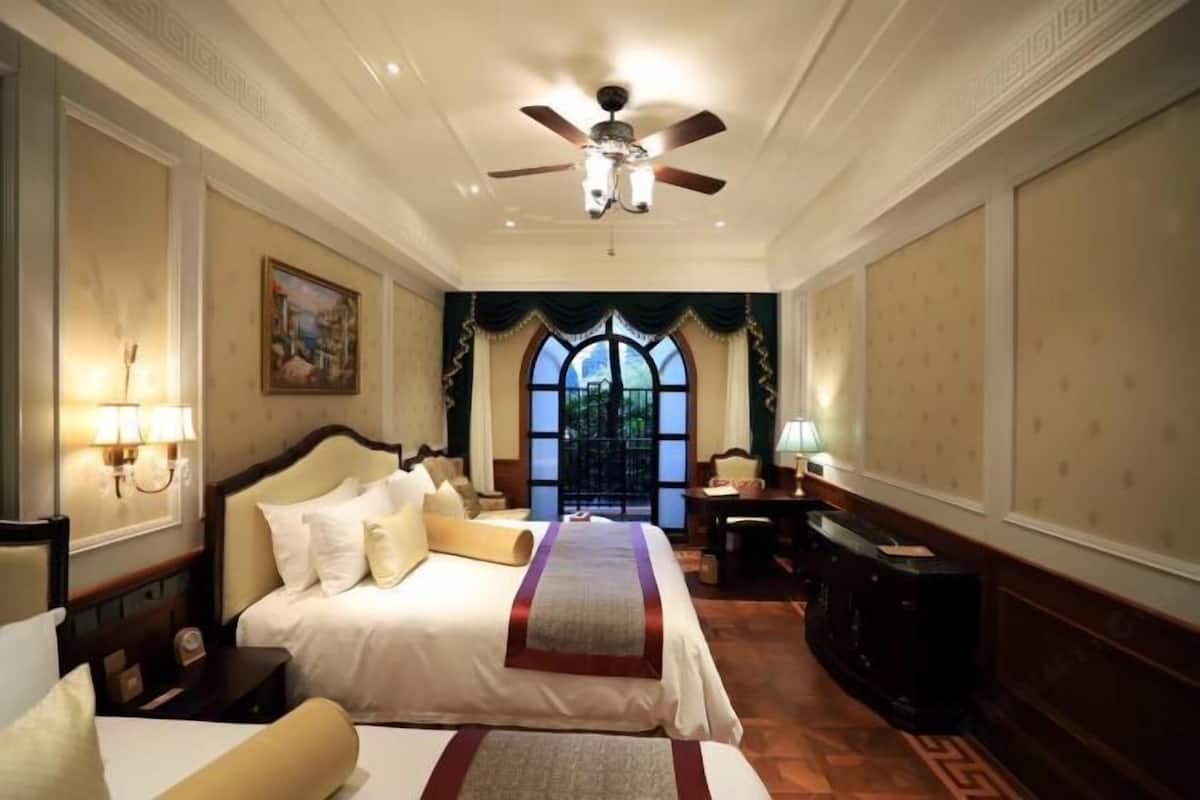 Premium bedding, memory foam beds, minibar, in-room safe