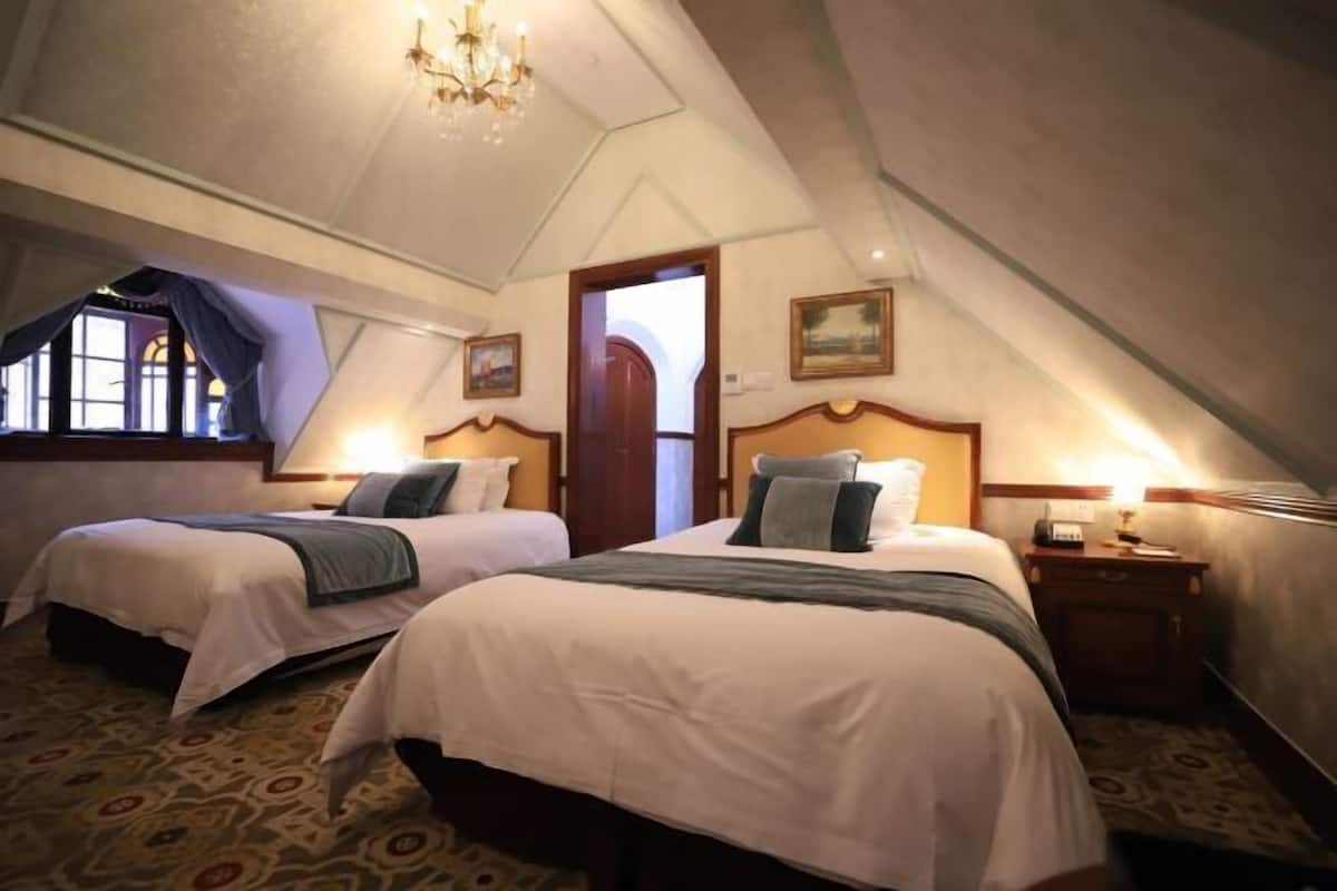 Premium bedding, memory foam beds, minibar, in-room safe