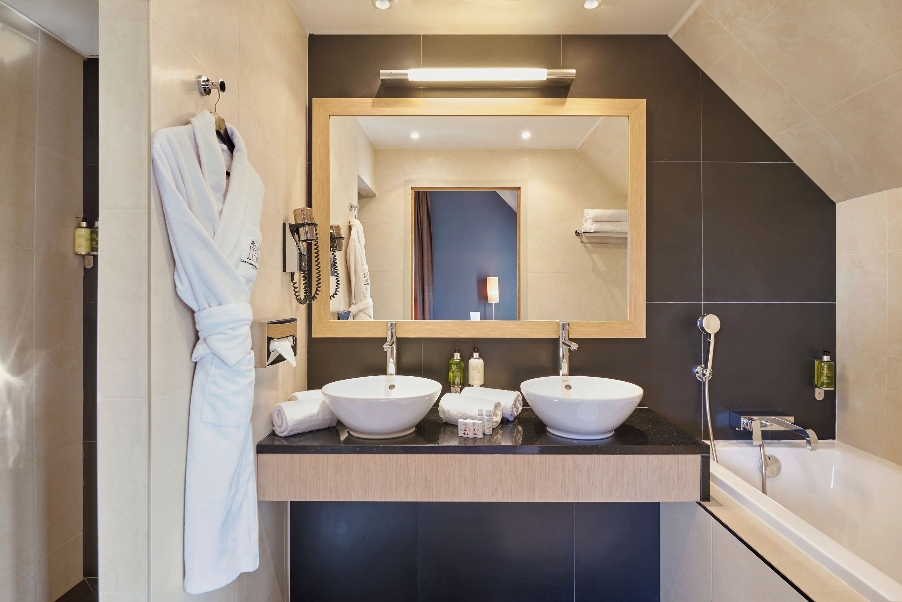 family room | bathroom | free toiletries, hair dryer, bathrobes, slippers