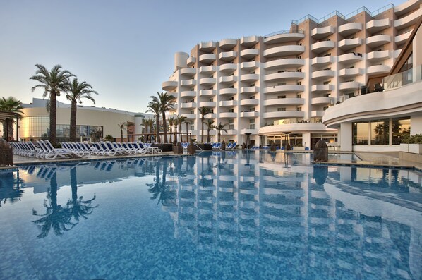 Indoor pool, outdoor pool, pool umbrellas