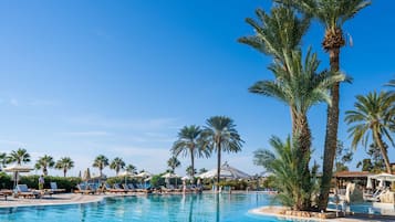 Indoor pool, pool umbrellas, pool loungers