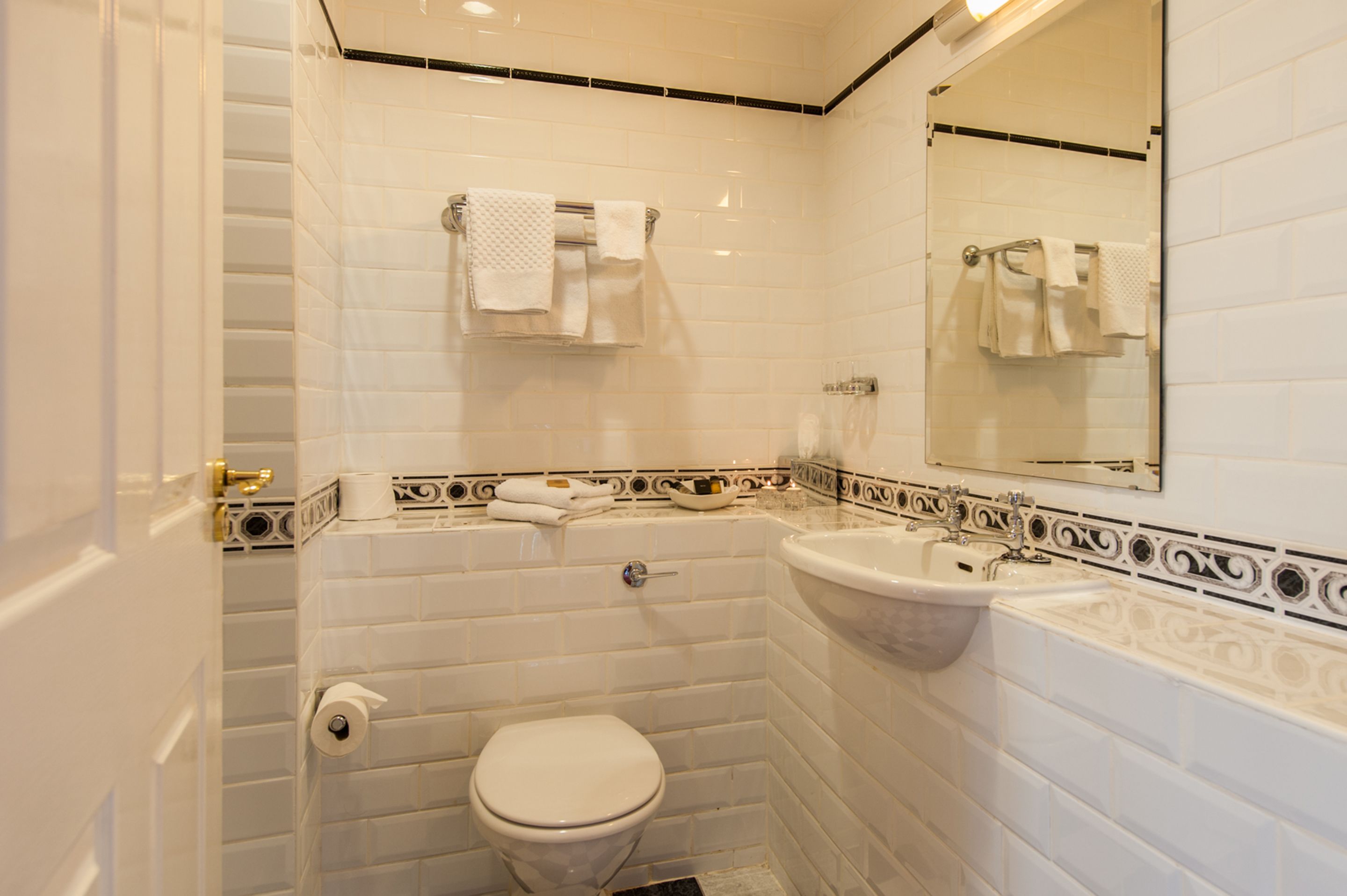 standard double room | bathroom | shower, rainfall showerhead, hair dryer, towels