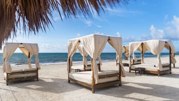 On the beach, white sand, beach massages