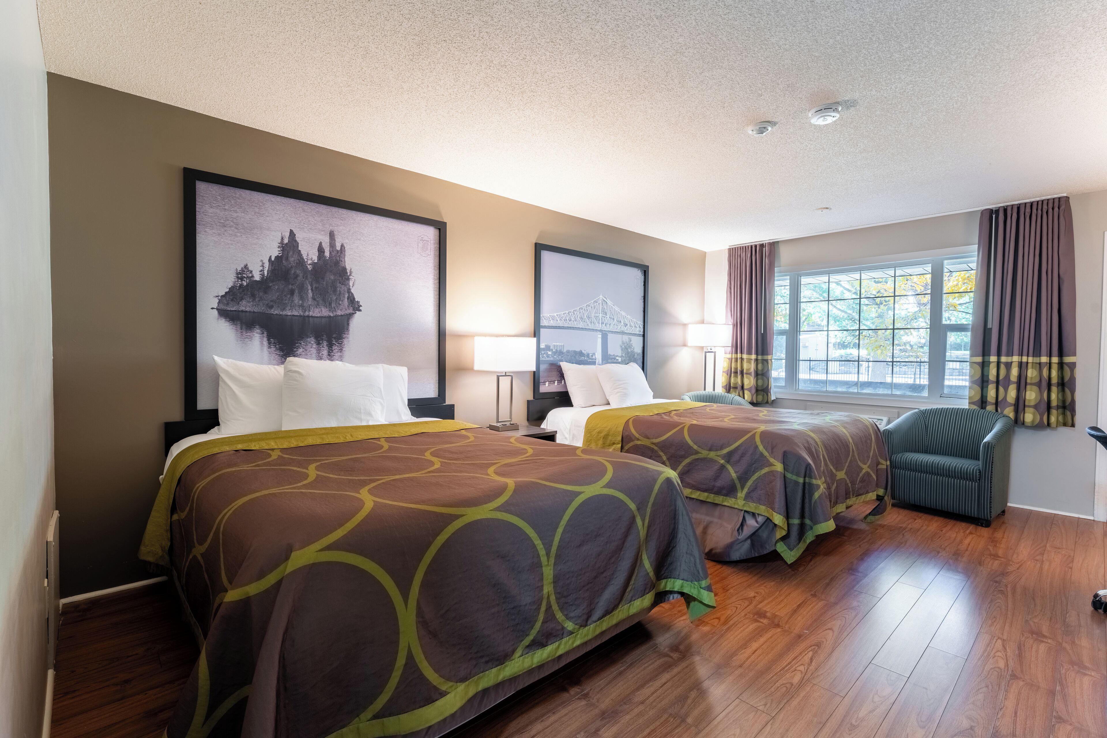 Deluxe Room, 2 Queen Beds, Non Smoking, Pool View | Desk, laptop workspace, blackout drapes, iron/ironing board