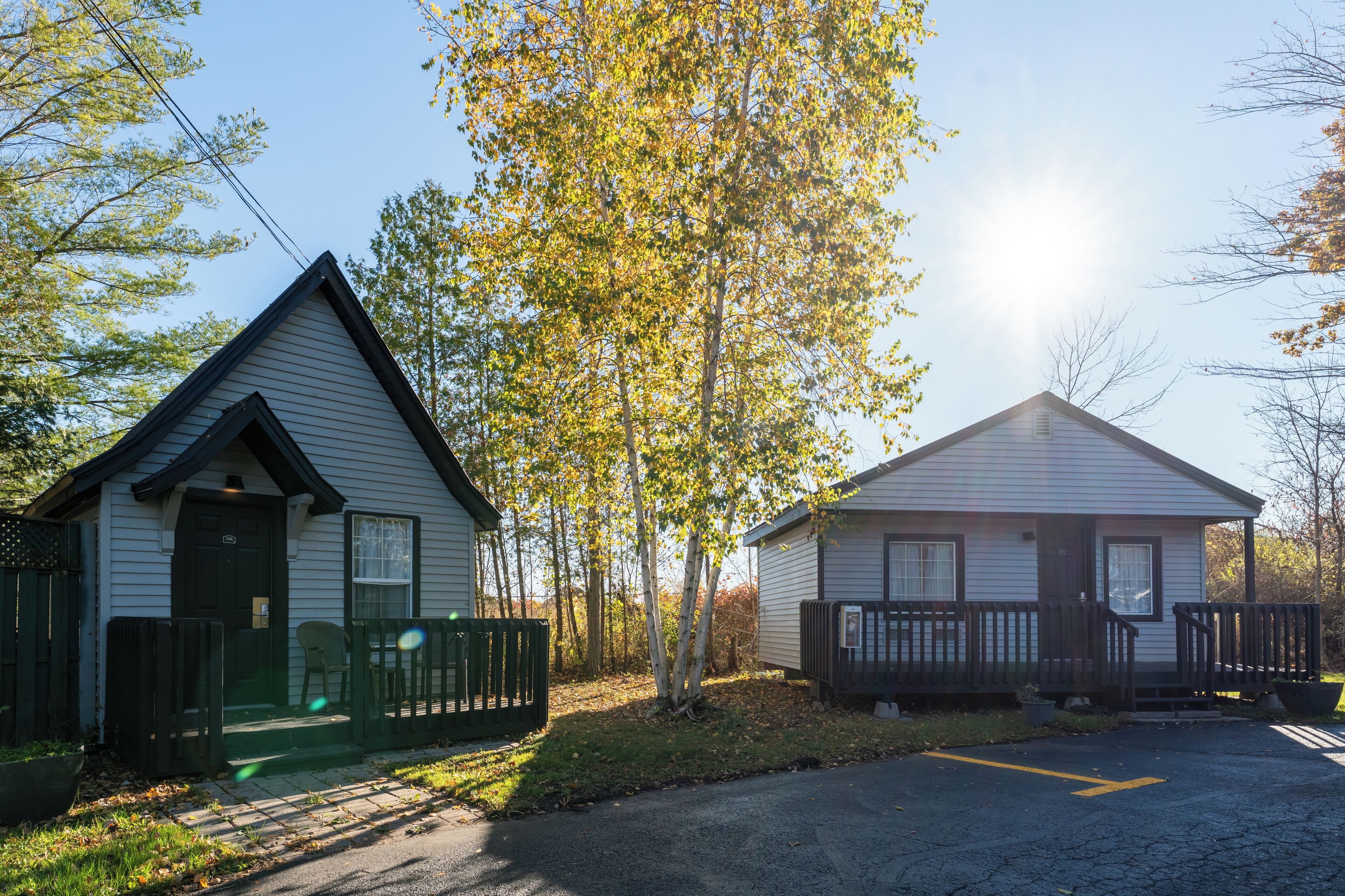 Desk, laptop workspace, blackout drapes, iron/ironing board