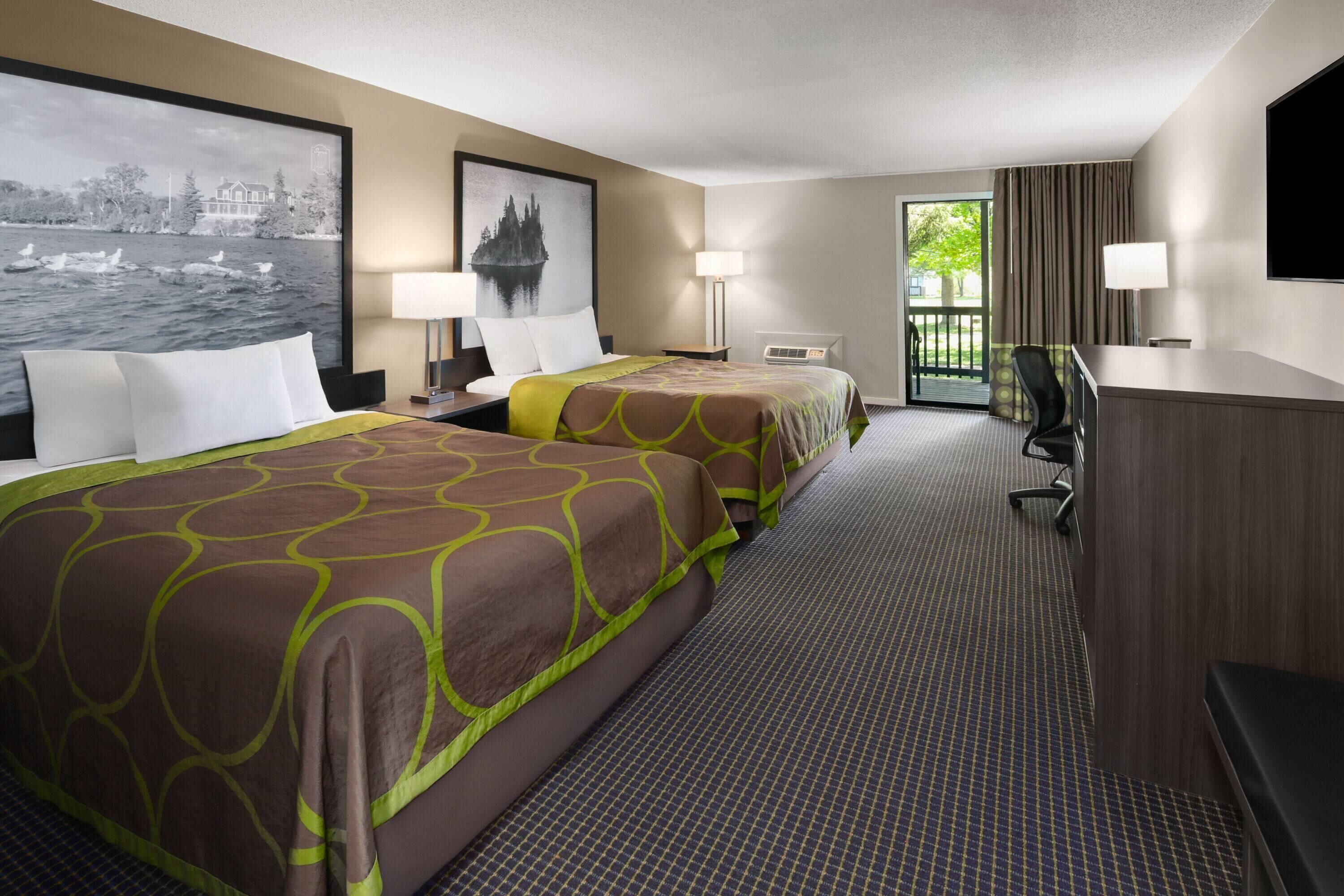 Room, 2 Queen Beds, Non Smoking, Pool View | Desk, laptop workspace, blackout drapes, iron/ironing board