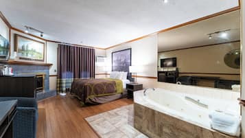 Desk, laptop workspace, blackout drapes, iron/ironing board