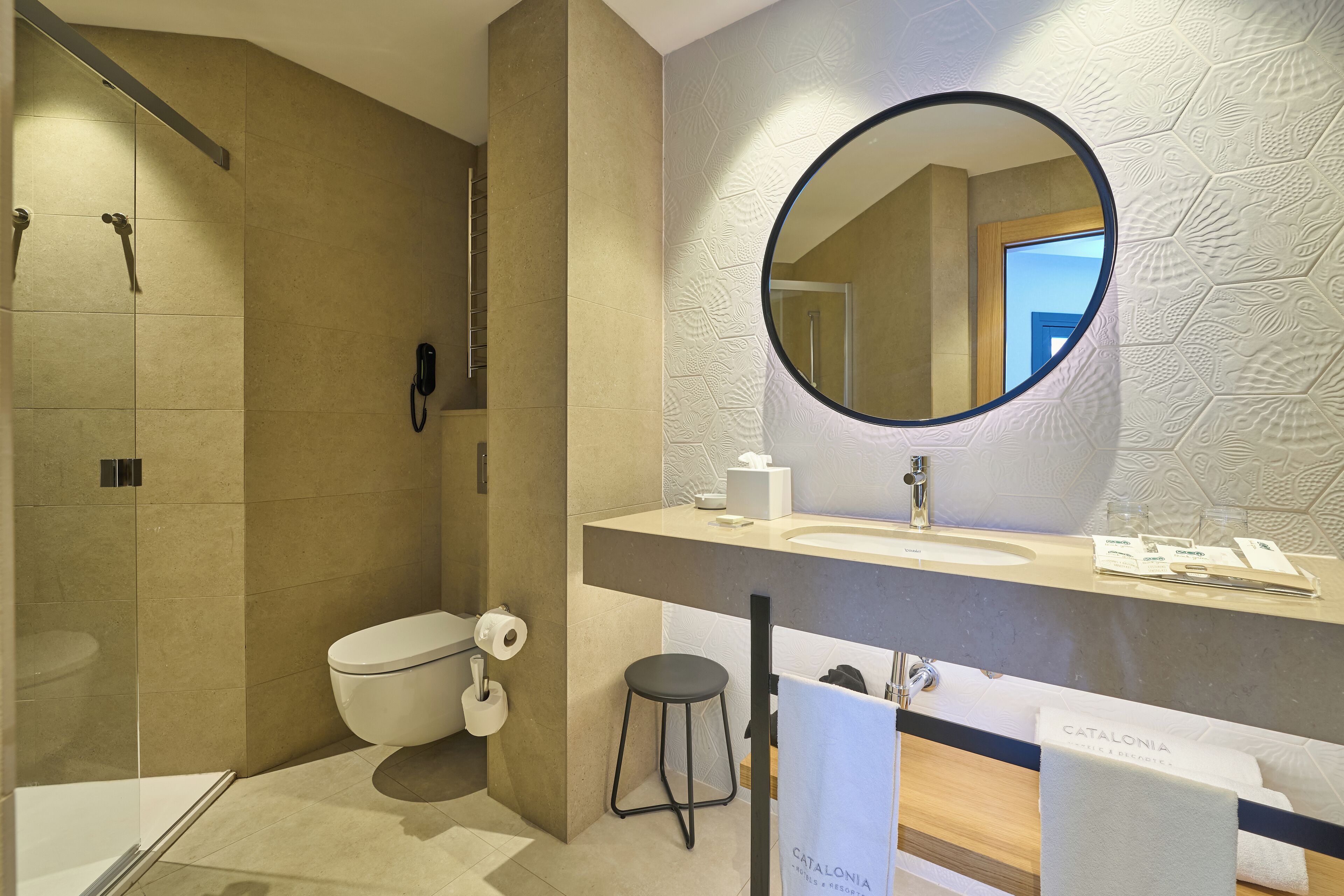 eco-friendly toiletries, hair dryer, towels