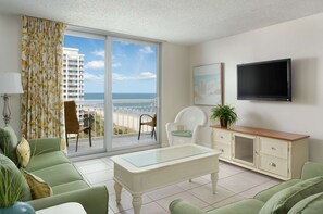 Condo, Ocean View | Living area | Flat-screen TV