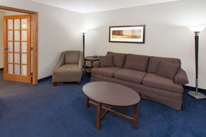 Suite, 1 King Bed (One-Bedroom Suite) | Living area | Flat-screen TV