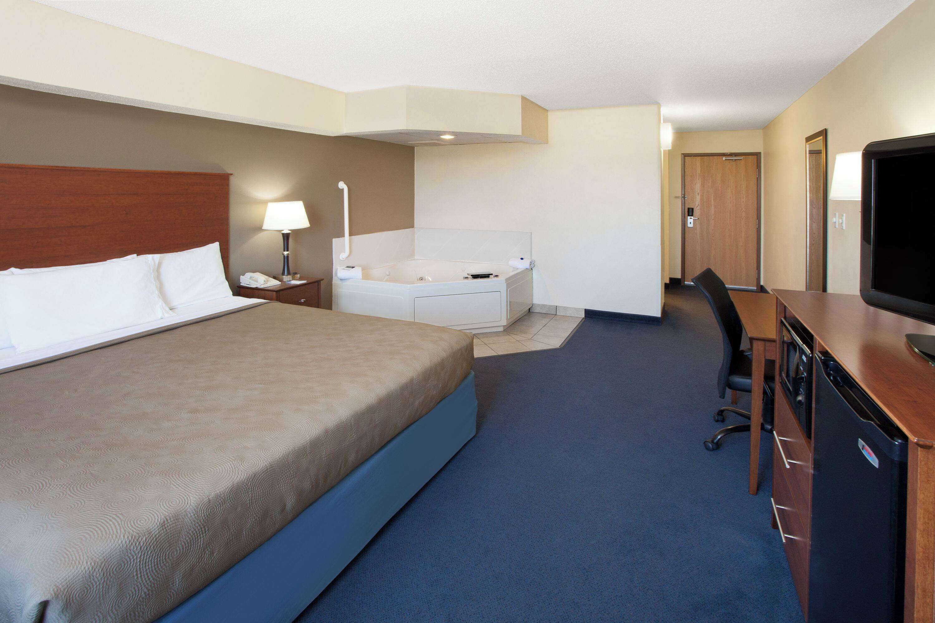 business suite, 1 king bed | blackout curtains, iron/ironing board, free cots/infant beds