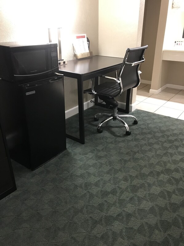 Desk, blackout drapes, iron/ironing board, free cribs/infant beds