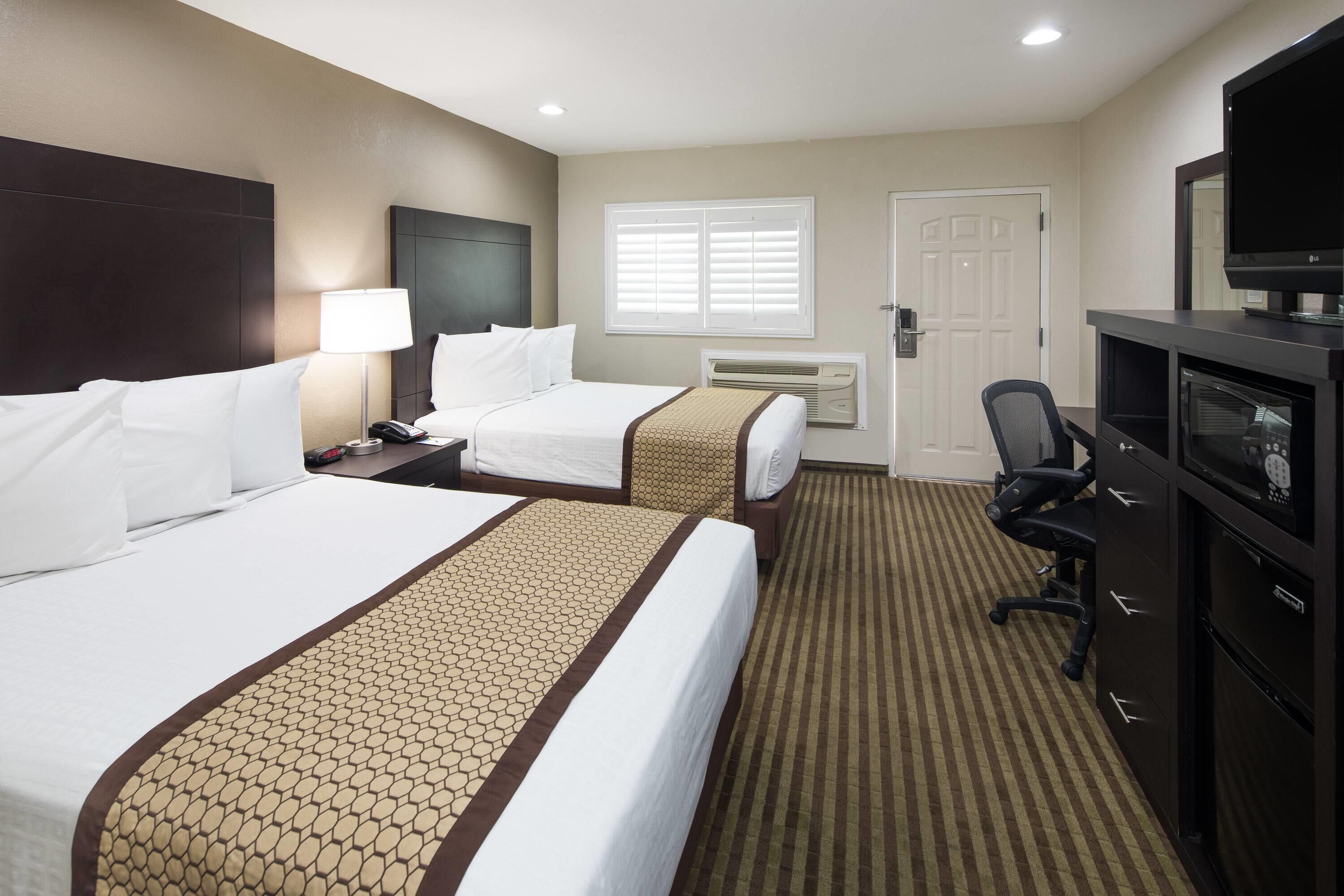 Desk, soundproofing, iron/ironing board, free cribs/infant beds