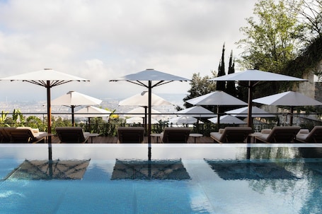 Indoor pool, outdoor pool, pool umbrellas