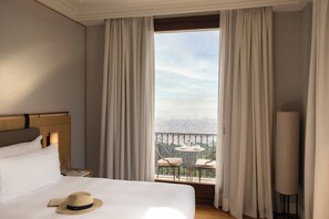 Premium bedding, down comforters, minibar, in-room safe