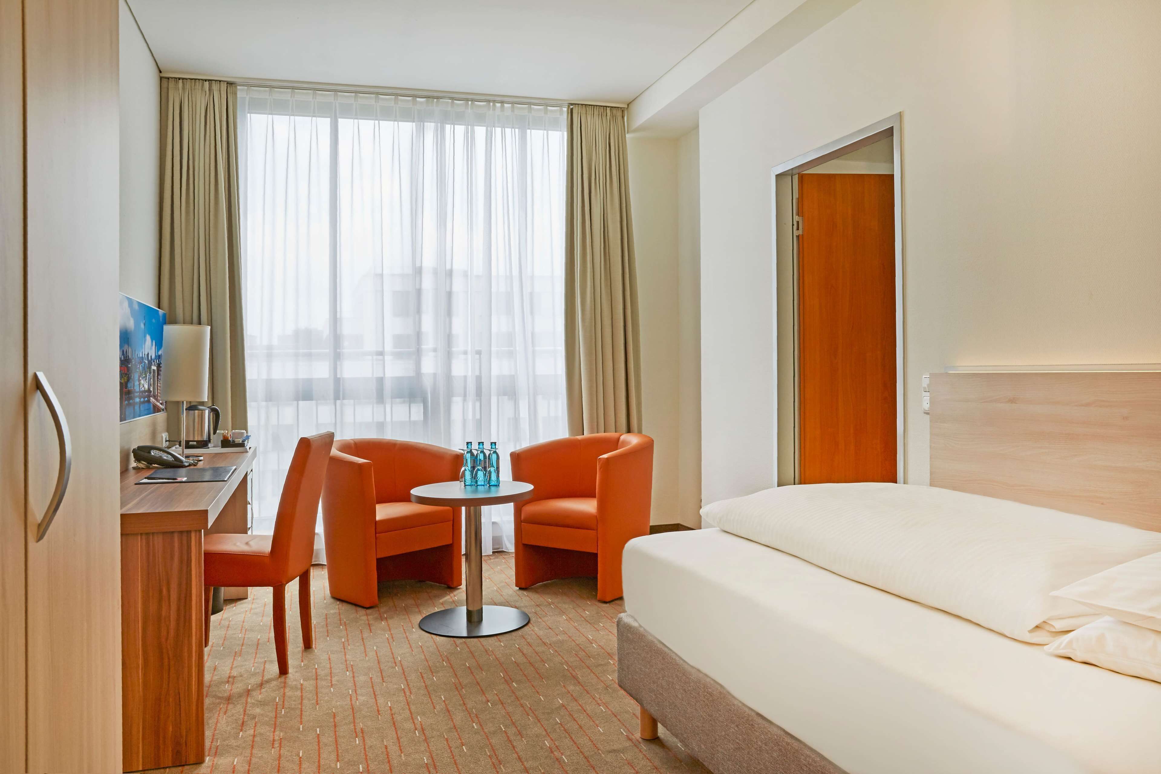 premium bedding, desk, blackout curtains, free wifi