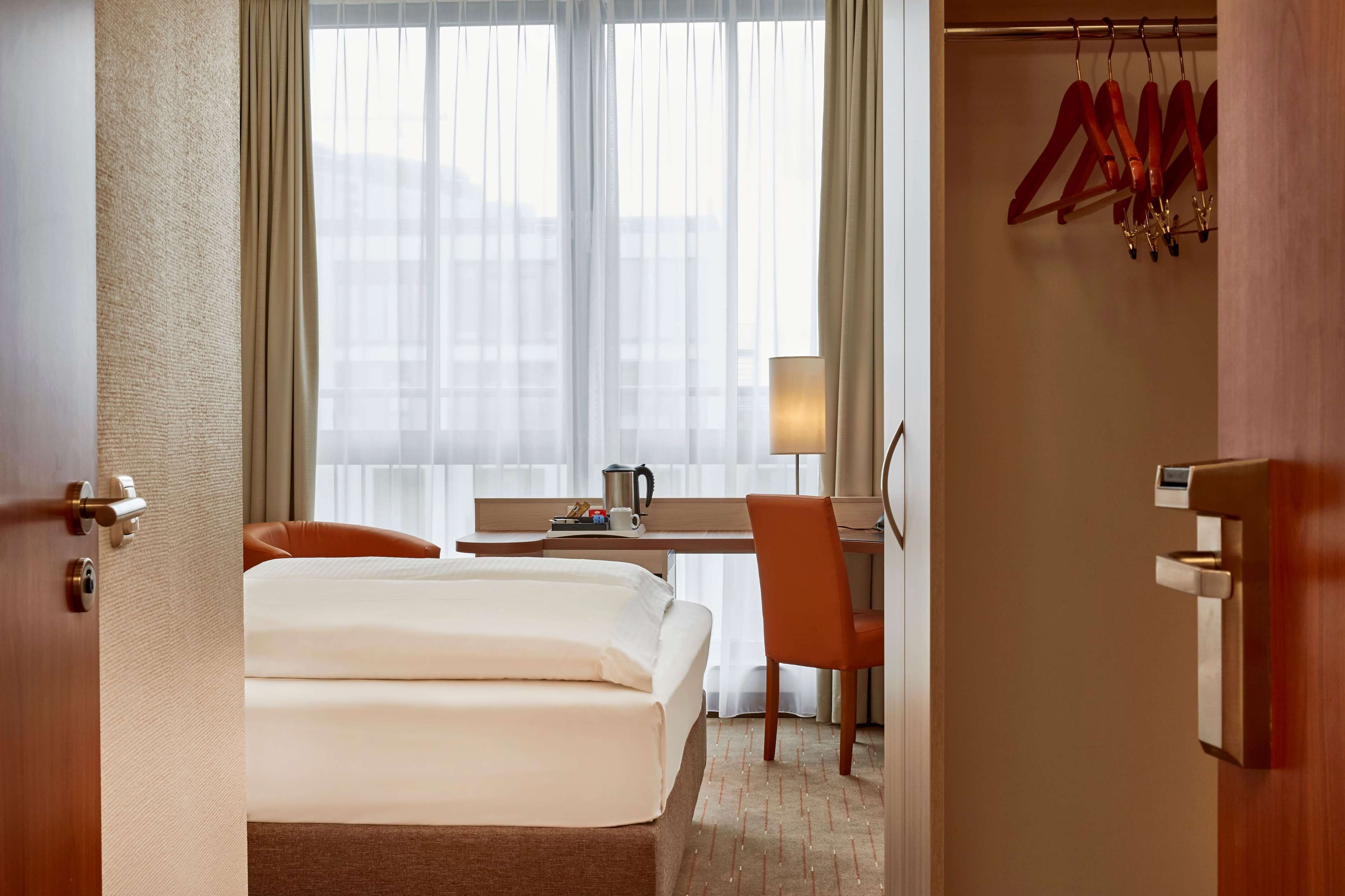 premium bedding, desk, blackout curtains, free wifi