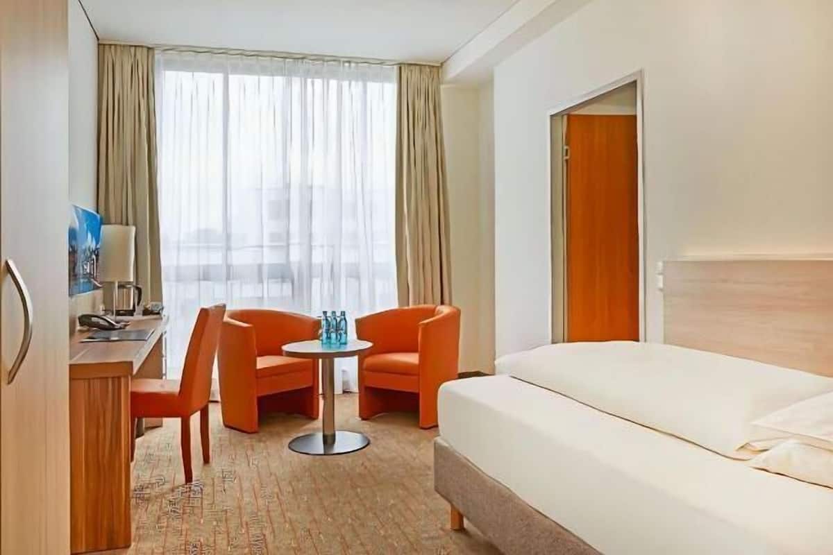 1 chambre, literie de qualité, bureau, rideaux d’obscurcissement