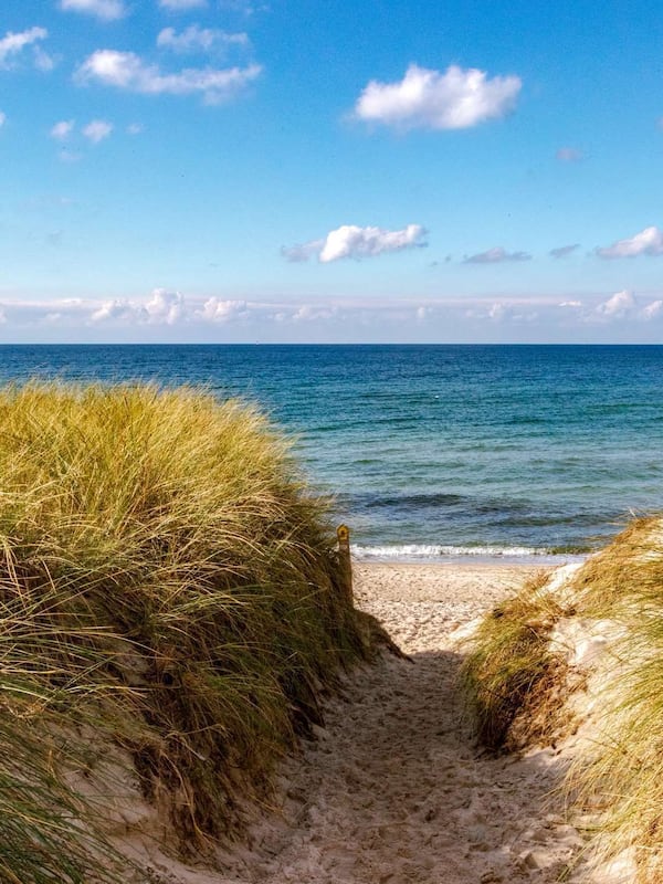 On the beach, sun loungers, beach umbrellas, beach towels