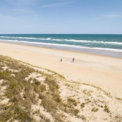 On the beach, sun loungers, beach umbrellas, beach towels