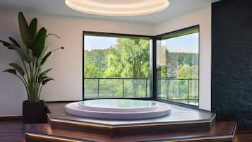 Salas de tratamiento para parejas, sauna y tina de hidromasaje
