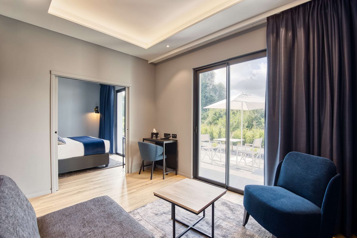 Deluxe Suite, 1 King Bed, Non Smoking, Golf View (with Sofabed) | 1 bedroom, premium bedding, minibar, in-room safe