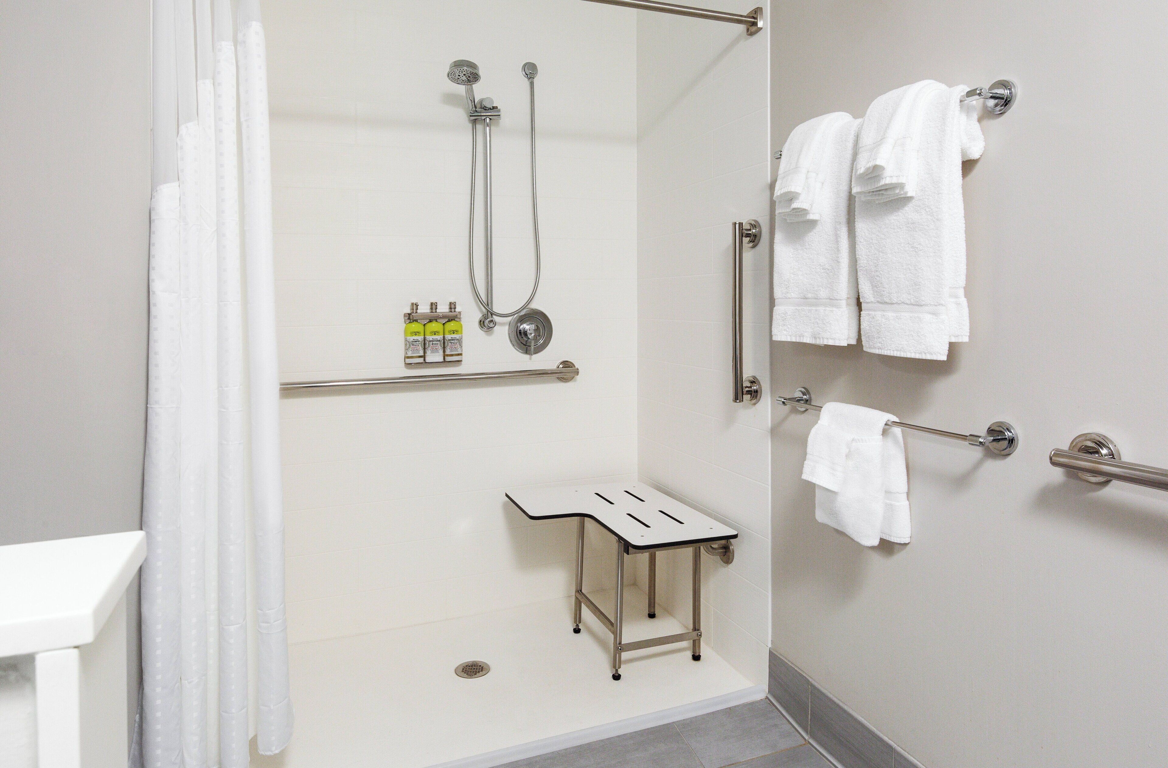 suite, 1 king bed, mobility accessible (communications, roll-in shower) | bathroom | free toiletries, hair dryer