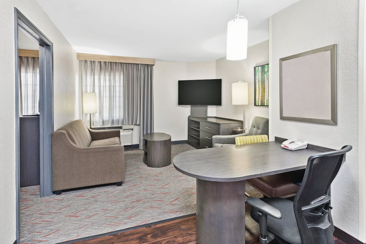 Suite, 1 Bedroom, Accessible (MOBILITY) | 1 bedroom, desk, laptop workspace, iron/ironing board