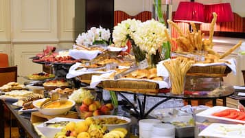 Daily buffet breakfast (USD 15 per person)