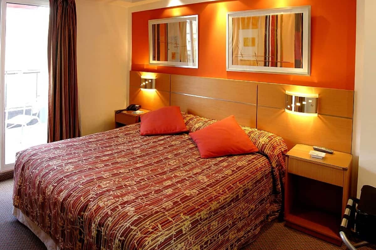 Down duvets, pillow-top beds, in-room safe, individually decorated