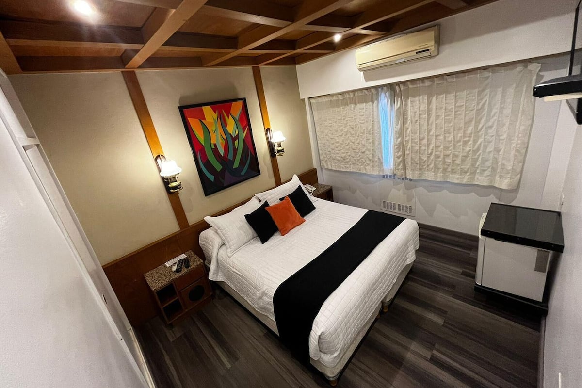 Down duvets, pillow-top beds, in-room safe, desk