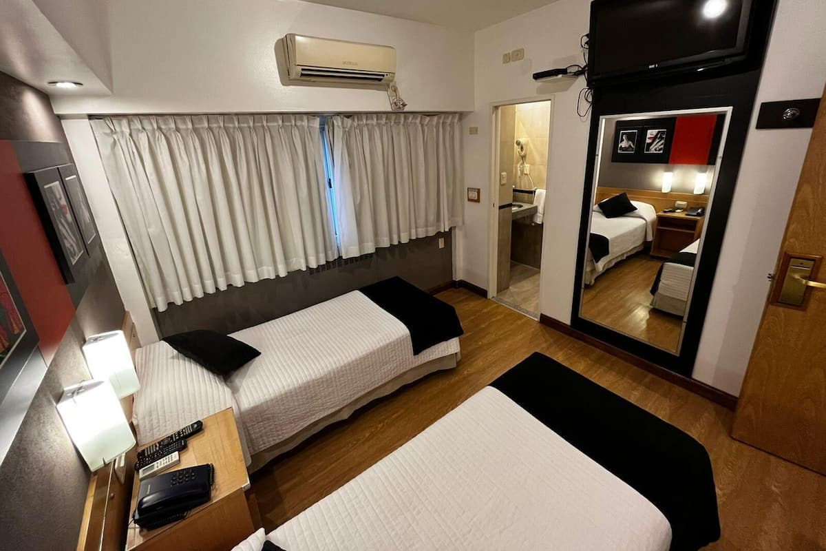 Down duvets, pillow-top beds, in-room safe, desk