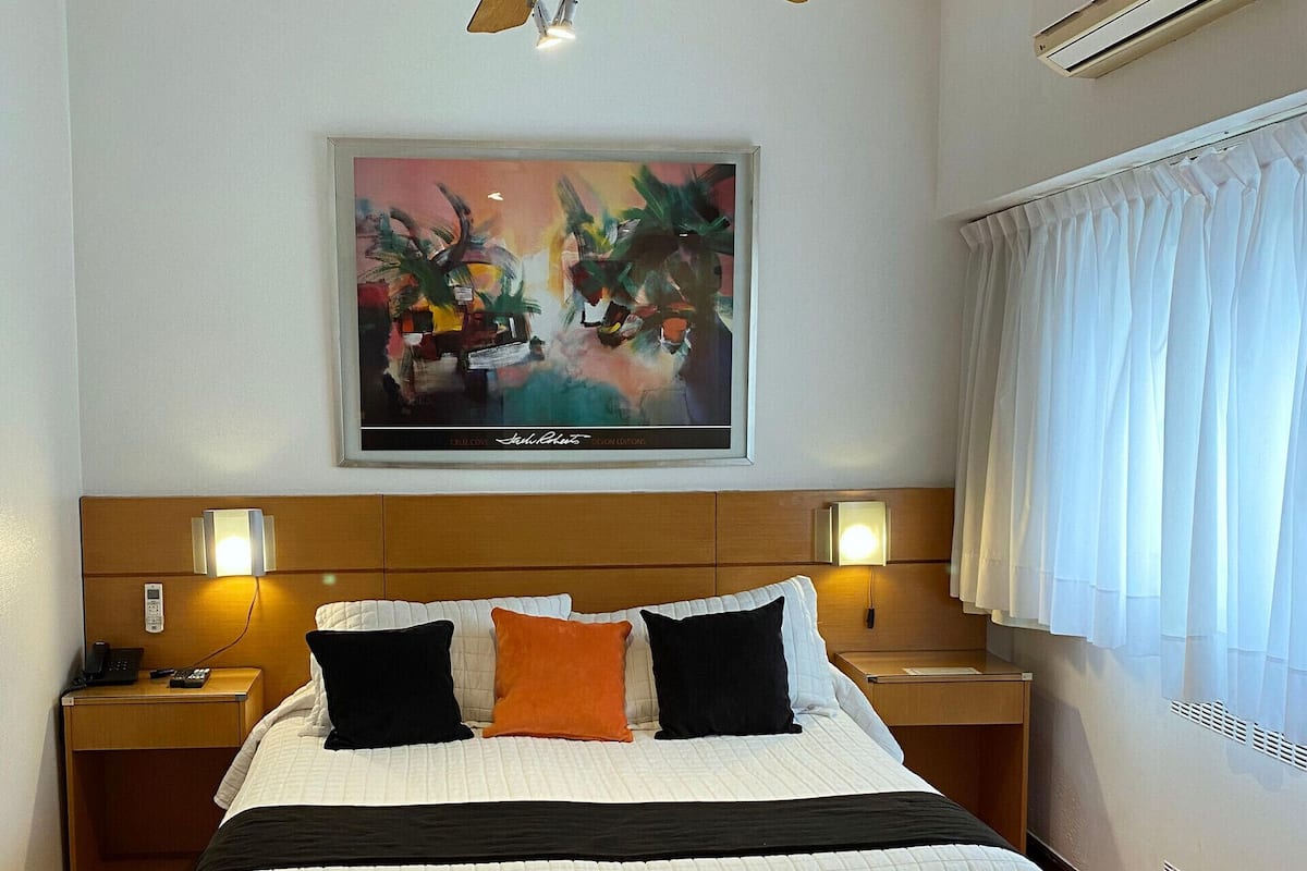 Down duvets, pillow-top beds, in-room safe, desk