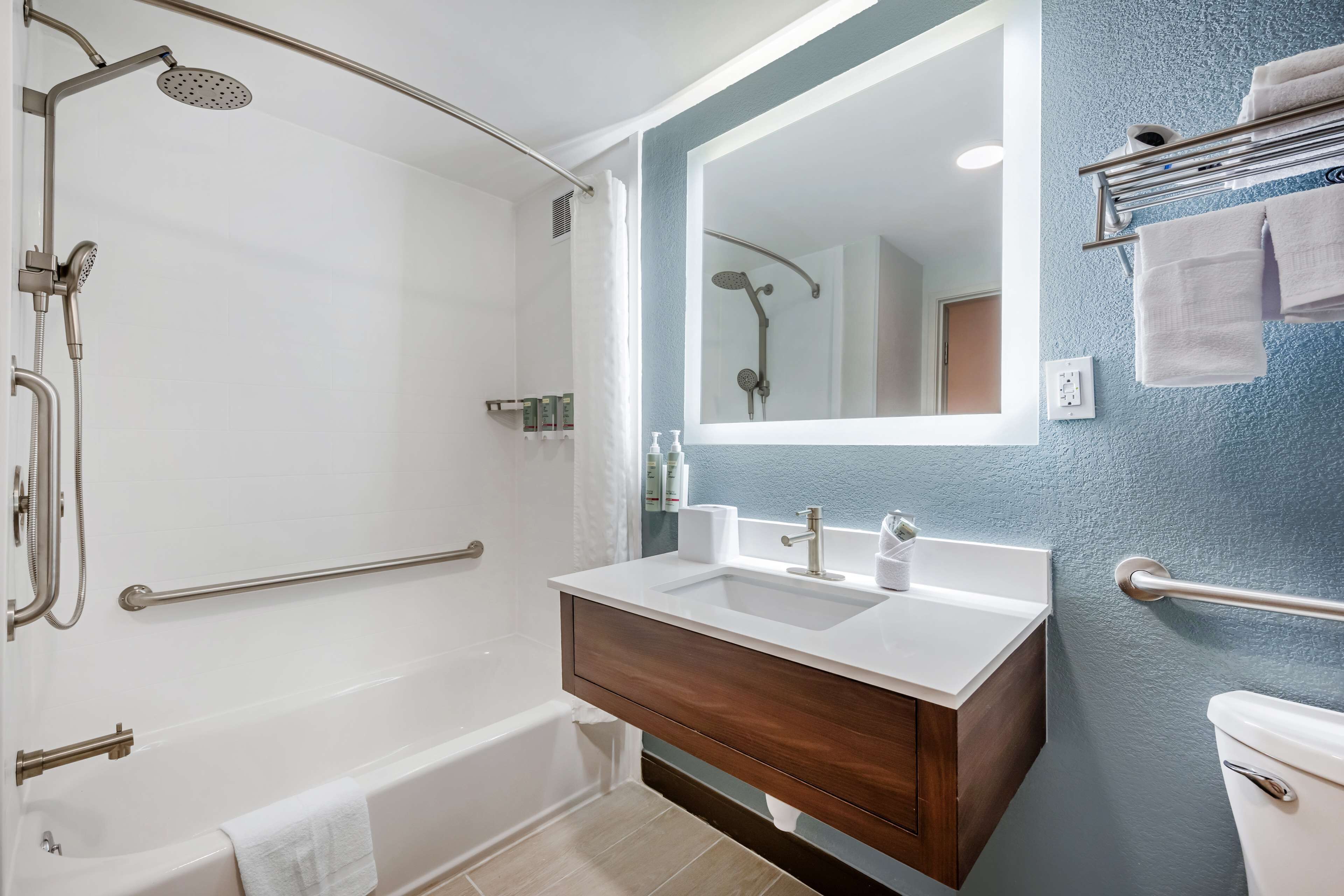 standard room, 2 queen beds, accessible, refrigerator & microwave (larger room) | bathroom | combined shower/bathtub, hydromassage showerhead, free toiletries