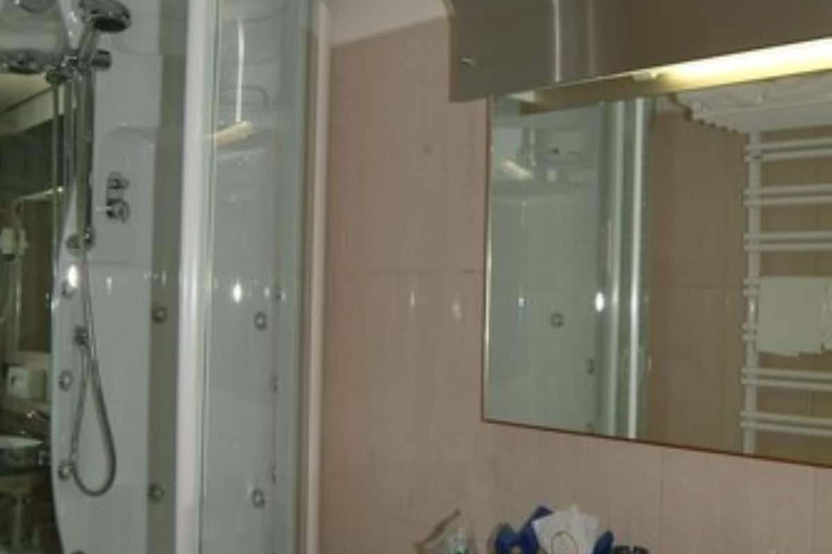 hair dryer, slippers, bidet, towels