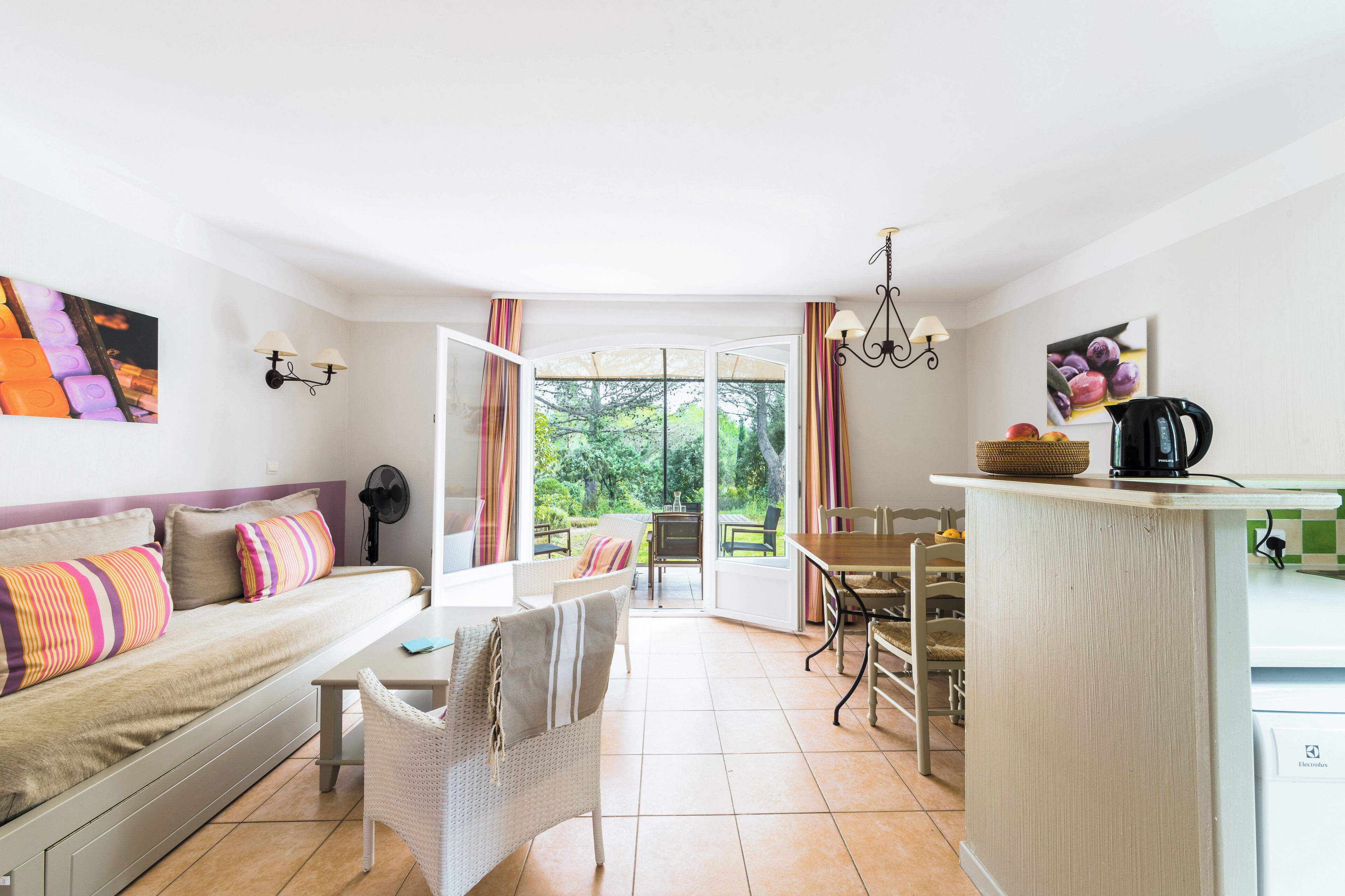 House 6 people - 2 bedrooms - Duplex - Garden - Taillades district | Living area | Flat-screen TV, ping pong, books