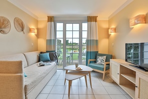 Maison 4 personnes - 1 chambre - Terrasse - Duplex - Quartier Domaine du Moulin - Rénové | Wohnbereich | Fernseher, Tischtennisplatte